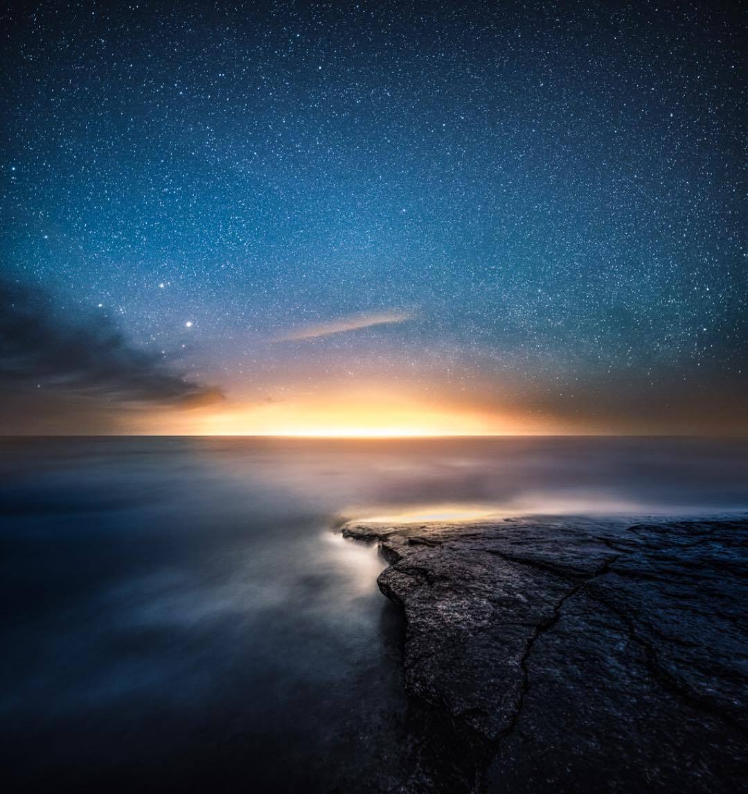 "Witness the power and grace of nature's forces shaping the world around us."