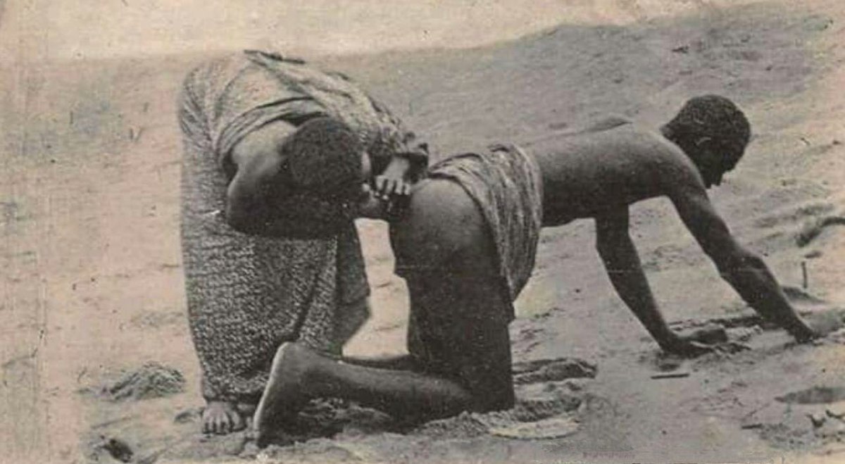 Trust the Science: A woman inserts an infusion of pepper into the man's anus. According to the beliefs of Côte d'Ivoire, this method helps to preserve the youth and beauty of a man's face.