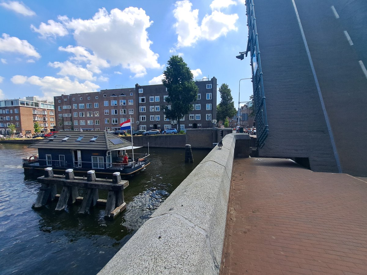 Bridge in Amsterdam opens to let house pass