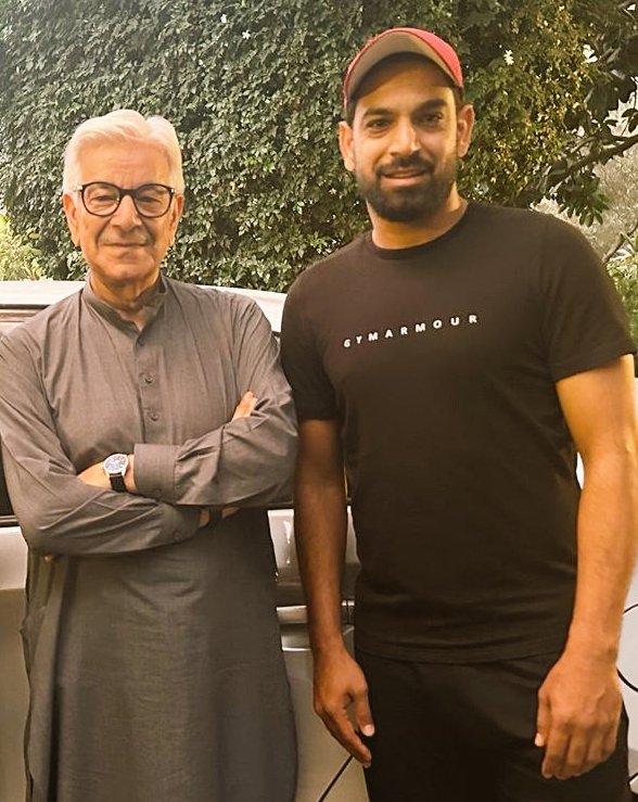 Haris Rauf with the Minister of Defense Khawaja Asif