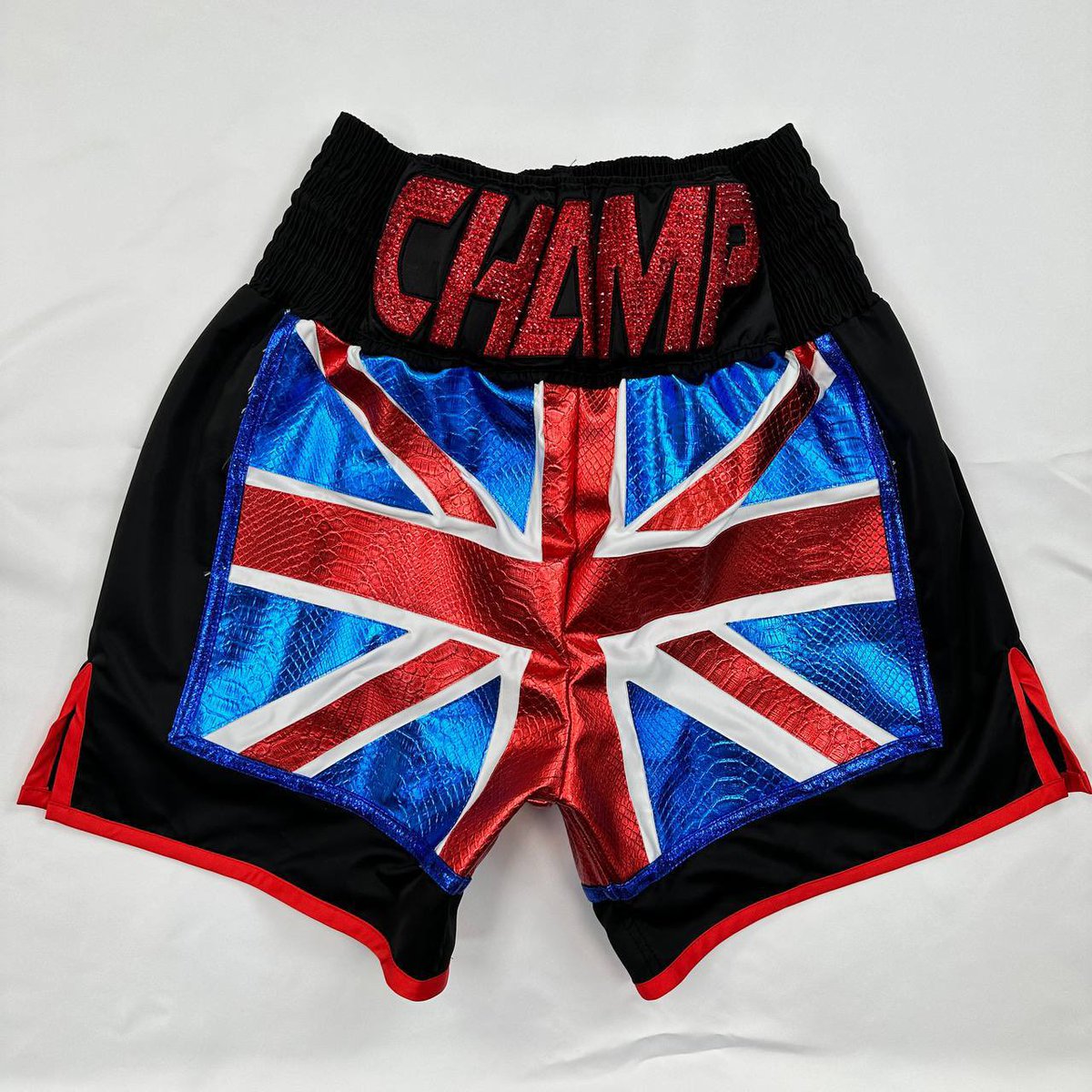 Unleash your style in the ring with 'United Kingdom' custom boxing shorts! 🥊🇬🇧 Crafted for comfort and durability, these shorts are fully customizable to reflect your unique personality. Step into the ring with confidence and order yours today! #BoxingShorts #CustomizeYourStyle