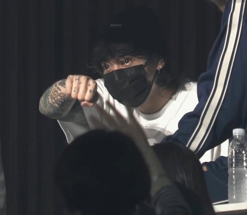 jeonIves's tweet photo. jungkook showing his army tattoo https://t.co/suW5LmLcMk