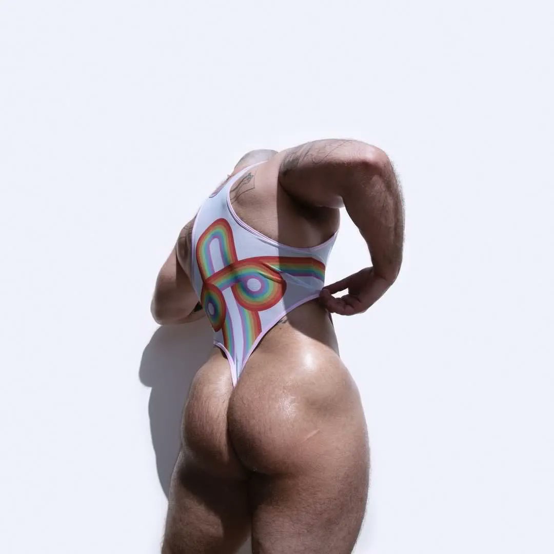 Flexing for Equality -  @kgmfo9 proudly dons his rainbow mesh bodysuit, showcasing his strength and support for the LGBTQ+ community during Pride Month.