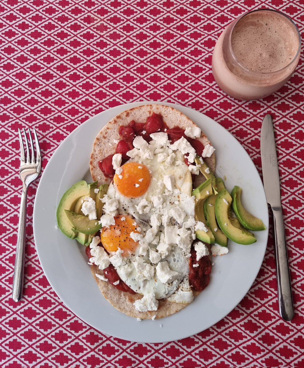 Huevos rancheros and an iced flat white by me. Been up since 8am as I couldn't sleep due to heat and already been shopping and for a walk. This is well deserved. It's amazing what you can do on a Sunday without a hangover.