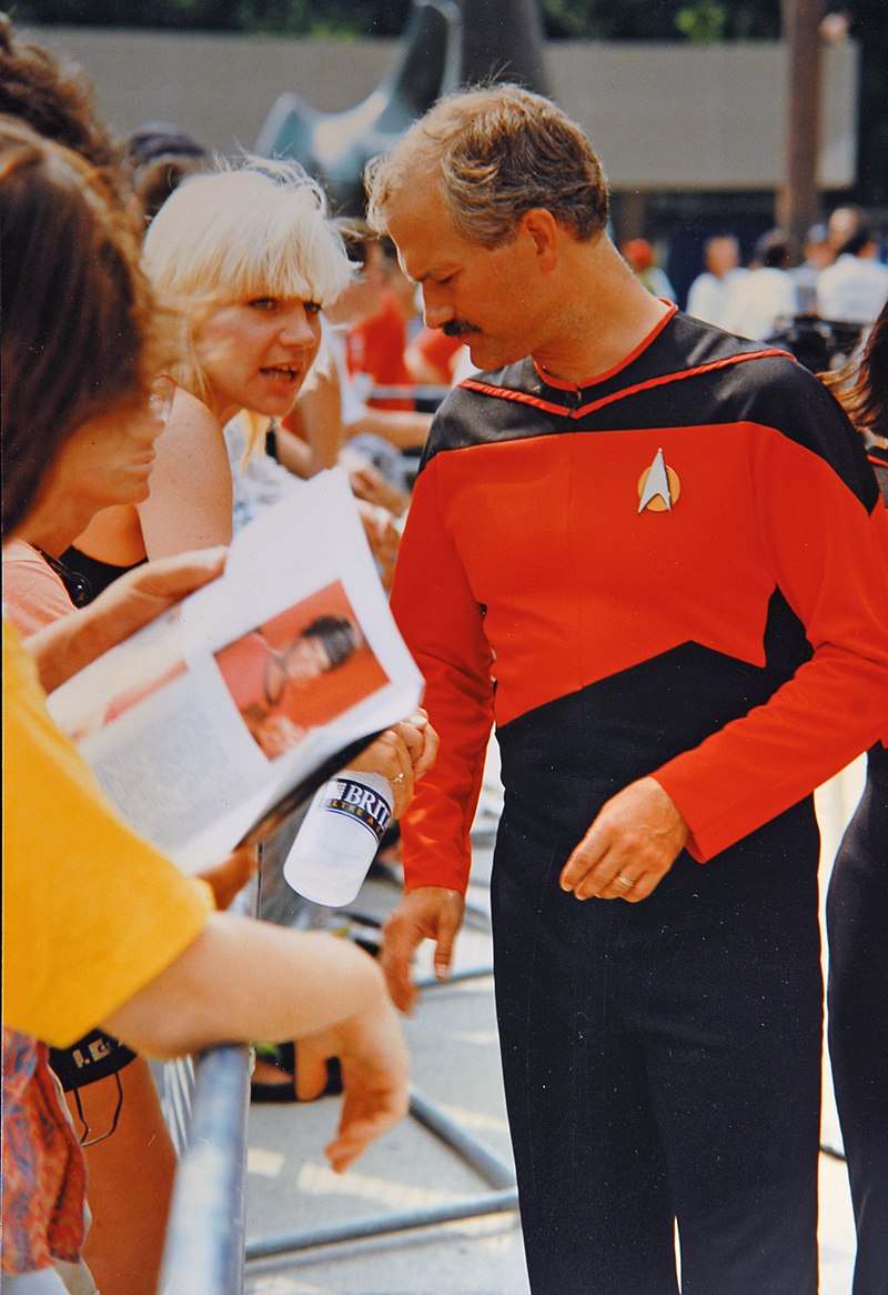CraigBaird's tweet photo. Jack Layton rocking a command red uniform from the Star Trek: The Next Generation era while attending a Star Trek Convention in Toronto in 1991. https://t.co/icOtH0yFwW