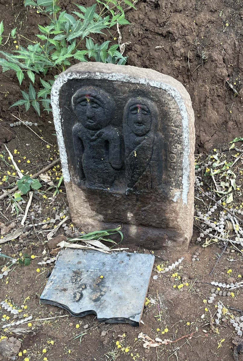 The practice of erecting stones in memory of people is mostly lost among urban South Indians nowadays, but this tradition persists rurally more than two millennia after its earliest attestations in literature.

NOTE: This is not a grave site, it is not a gravestone.