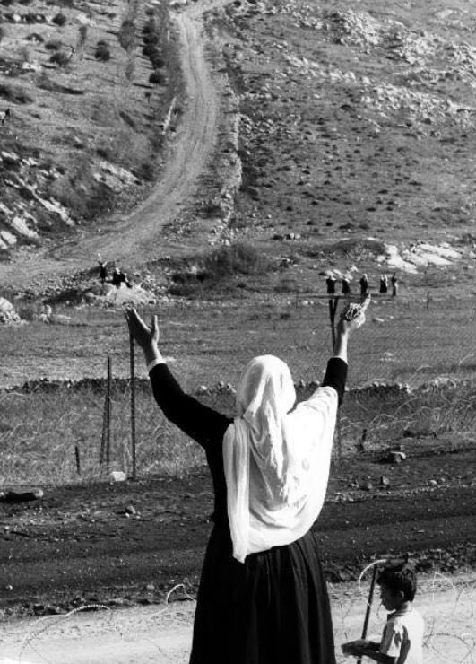 Golan Heights, Druze women at the ceasefire line near Majdal Shams, communicating with relatives on the Syrian side., 1975