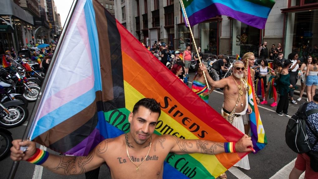 LGBTQ2S+ Pride revelers flash feathers and flags in the streets from New York to San Francisco ctvnews.ca/entertainment/…