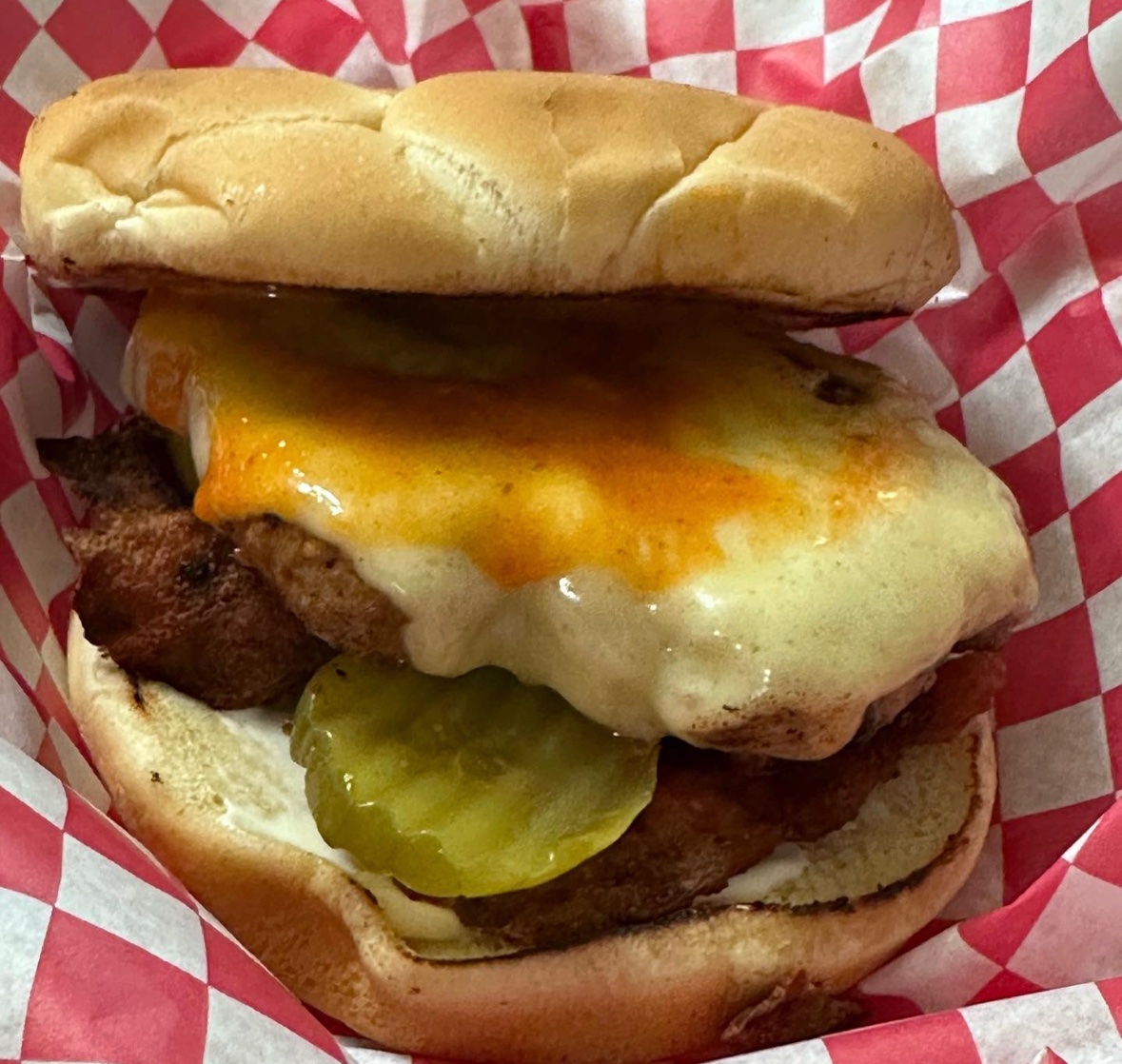Behold…The Lalo! Single QP with bacon, mayo, pickles and K red pepper aioli with Swiss cheese!