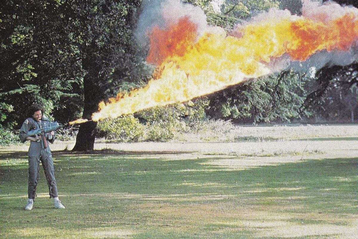 Sigourney Weaver testing a flamethrower for the movie Alien (1978). #behindthescenes