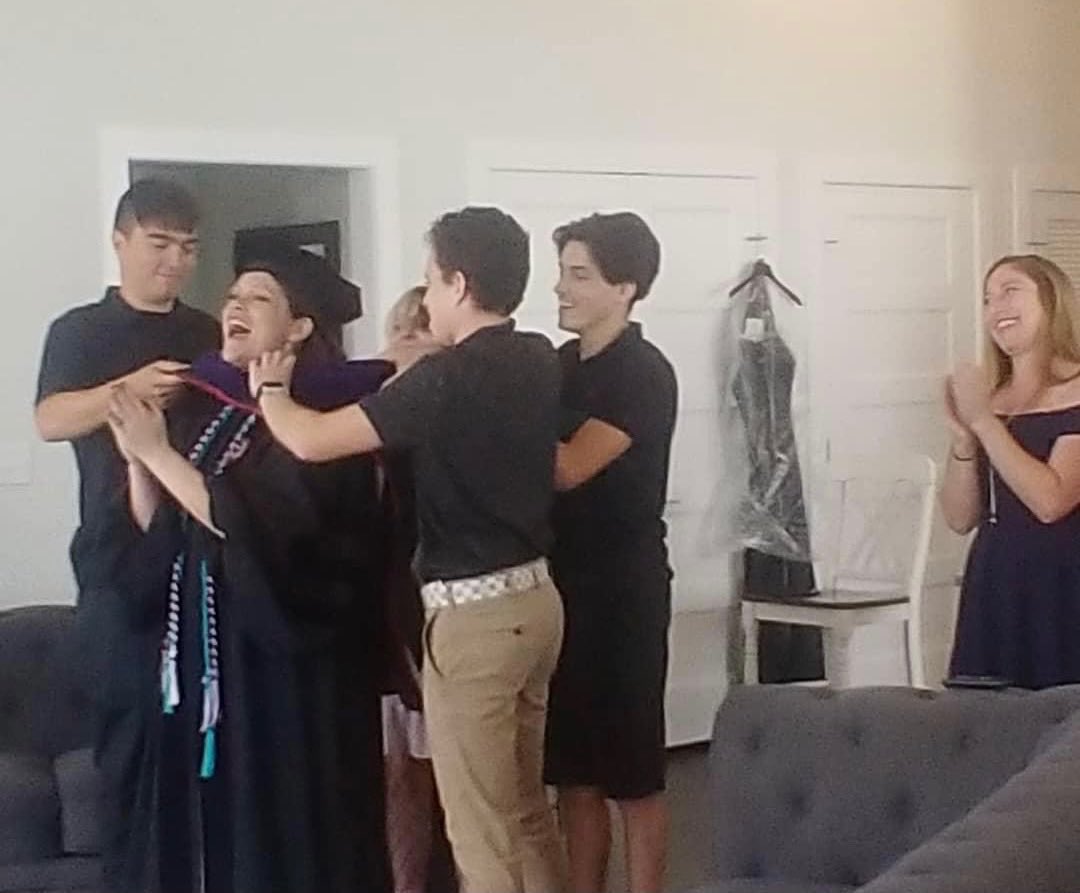 Two years ago today, I graduated from law school. In my home. With my family. My children doing the ceremonial “hooding.”Live-streaming with my fellow grads on my television. 

Accessibility matters.