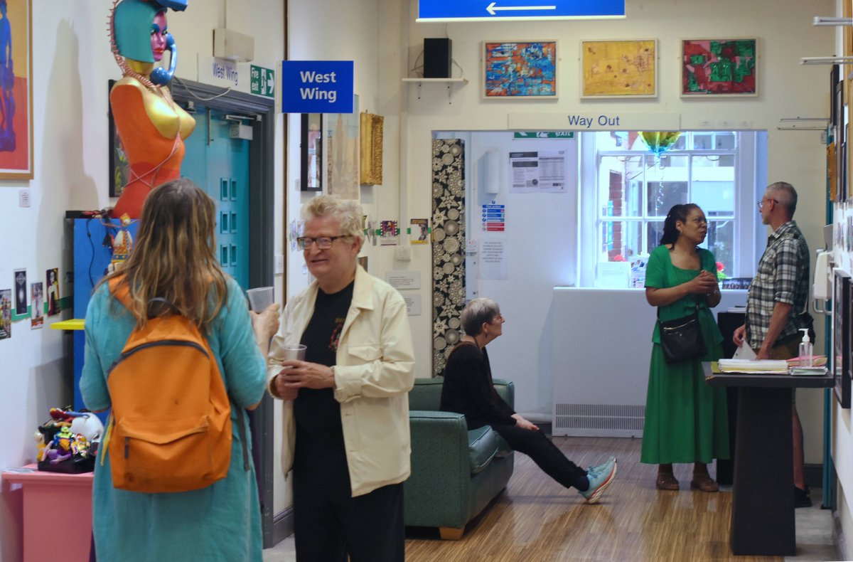 Visitors at the 'chilled' opening night of EMERALD 20 @CI_NHS Conference Centre Gallery on Friday 23 June. EMERALD 20 marks the 20th anniversary of <a href="/ArtsProjectLdn/">The Arts Project</a> and is  open to visitors on Mondays to Fridays (except Bank Holidays) until 29 September.