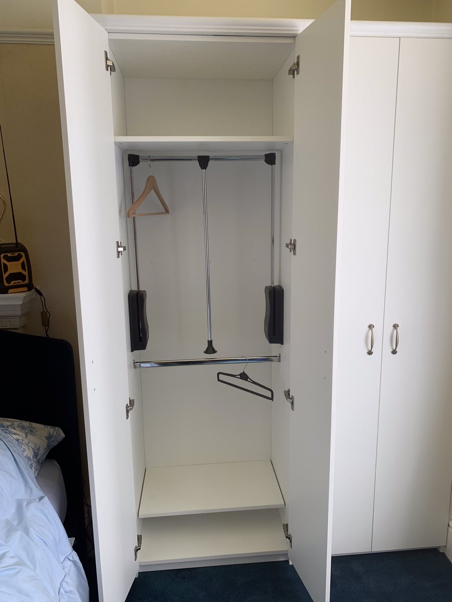 JMHcolchester's tweet photo. Wardrobe and shelving for JMH this week. The furniture was specially designed with low and pull down rails for a customer who uses a walking aid and needs to be able to sit in front of the wardrobe. #sbswinner #gobespoke #SmallBusiness #colchester #design https://t.co/gaLazhChq4