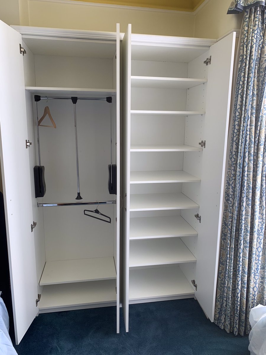 JMHcolchester's tweet photo. Wardrobe and shelving for JMH this week. The furniture was specially designed with low and pull down rails for a customer who uses a walking aid and needs to be able to sit in front of the wardrobe. #sbswinner #gobespoke #SmallBusiness #colchester #design https://t.co/gaLazhChq4