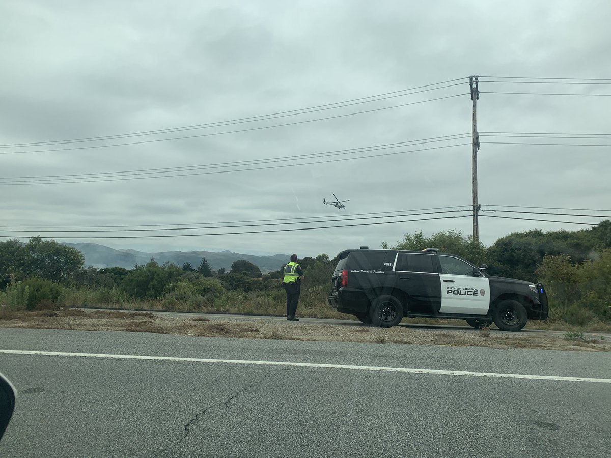 AnikkaTV's tweet photo. Fire between #Lompoc and #Vandenberg Village by Highway 1, possibly in or near the riverbed. Low-flying helicopter on scene and you’ll have to use an alternate route into the city for now. May not be very warm, but that doesn’t mean a fire can’t spark or spread. #cawx #wildfire https://t.co/ZPMYWHpxmf