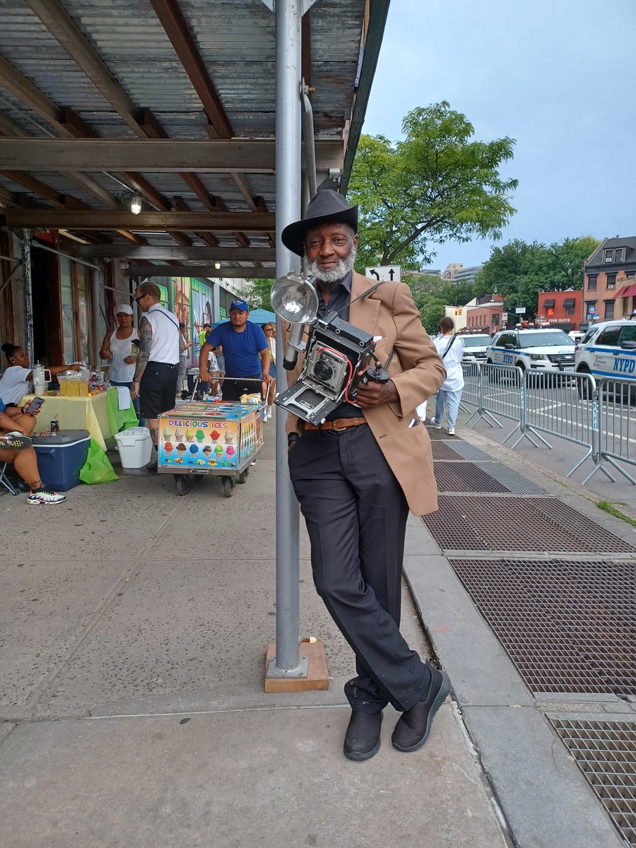 The only picture I took today at the Pride Parade. This guy was standing there looking so freakin cool & I asked if I could take his picture. He wanted me to send it to him & said, 'Google my name.' It was iconic NYC street photographer Louis Mendes!