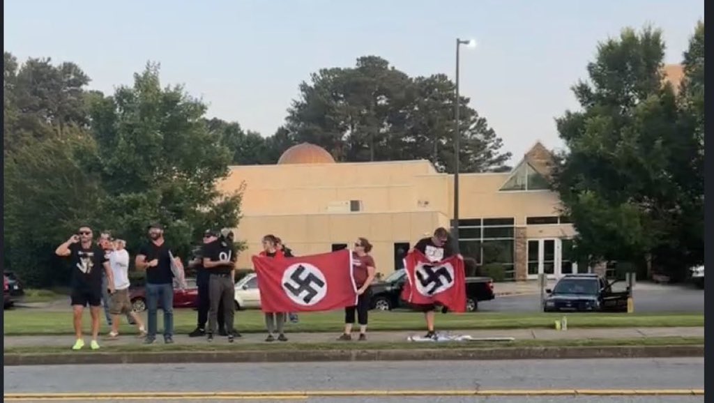 Long Island NY in 1937 and Georgia in 1923, American Traitors fly the NAZI flag.

It was despicable then, and now. None of these people are Patriots. They were Fascists in 1937, and Fascism is on the rise today.

There is absolutely no redemption for any of them. 
#FreshResists