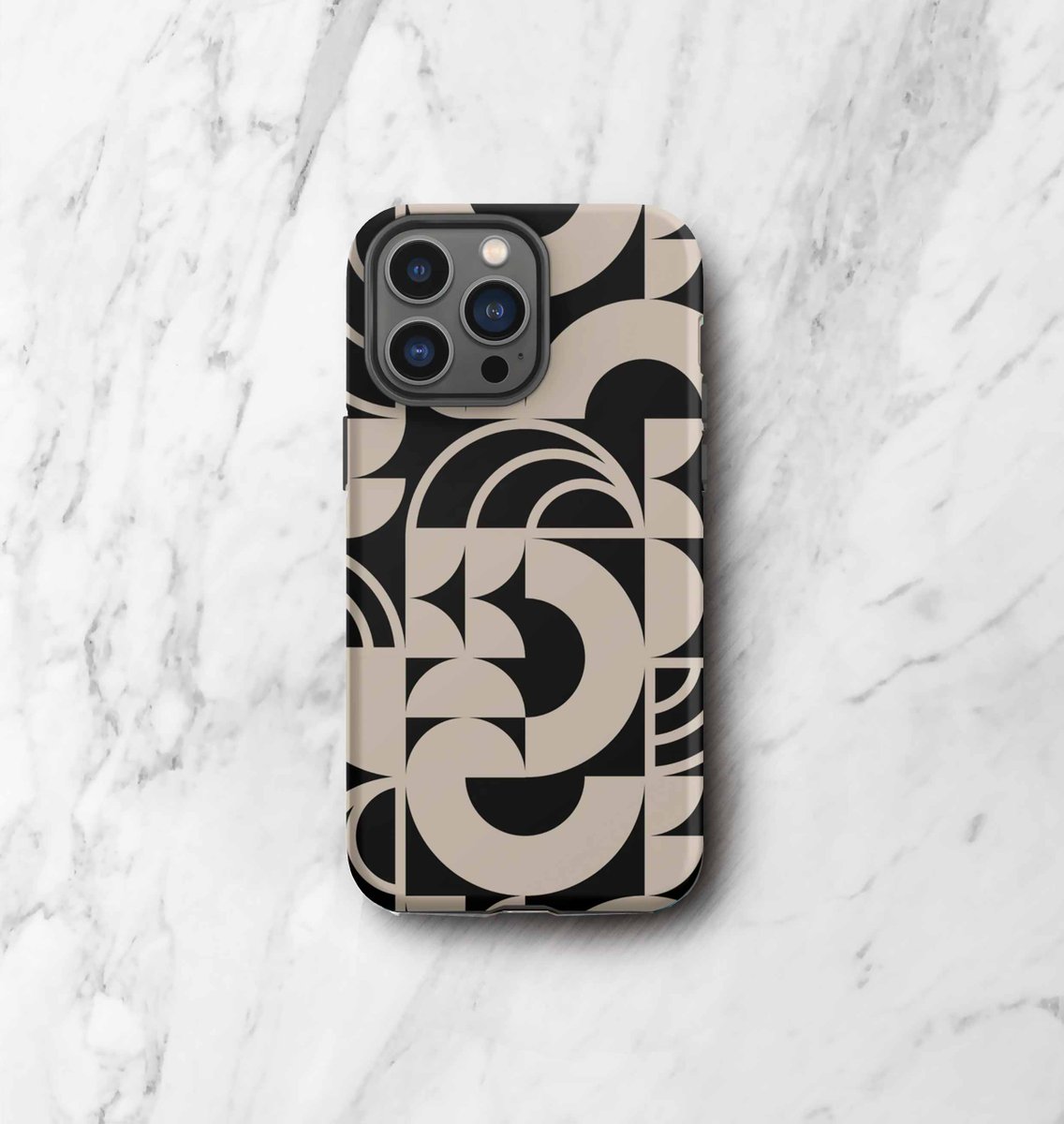 📱✨ Make a bold statement with the new cream on black version of our Geometria II design. Order now at tinyurl.com/unpzymrn #PhoneCase #Nosmal #iphonecase