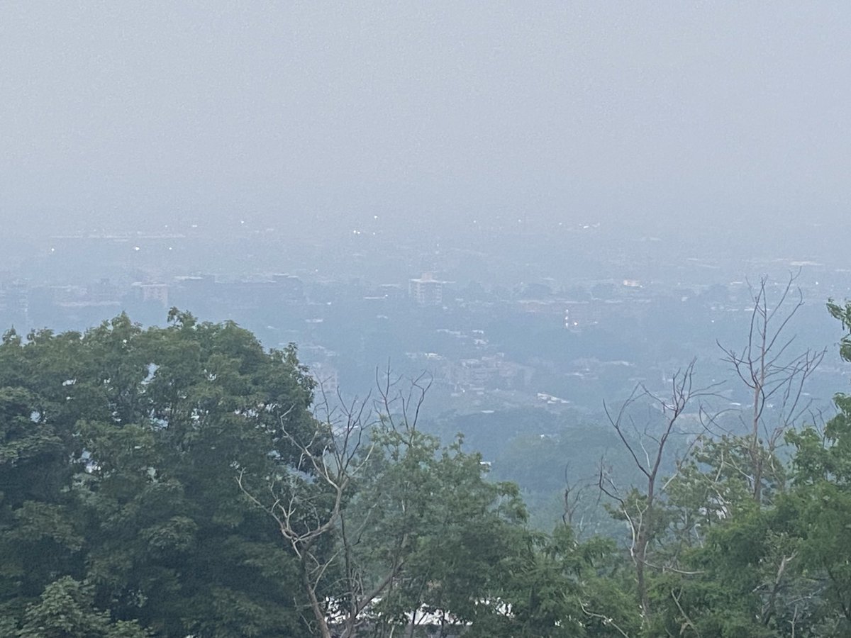 The Montreal skyline cloaked in a smoky haze from the Westmount lookout point, Sunday evening. My nostrils and throat itch from smoke even though I’m wearing a mask. Is this the future of climate change?