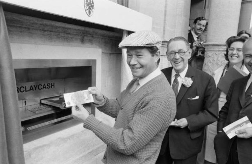 archivetvmus71's tweet photo. On this day in 1967, Reg Varney was the first member of the public in the world to use a cashpoint dispenser. This historic occurrence took place at Barclays Bank in Enfield High Street, Middlesex. https://t.co/HAwoCD7b16