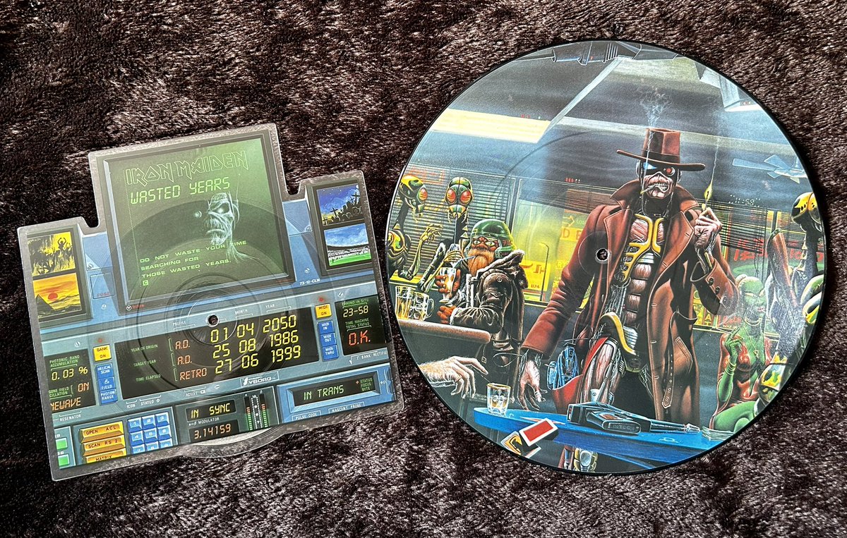 CraigRunner's tweet photo. Now listening to @Maidenpod @IronMaiden and excited for Nottingham in a week. The two single picture discs from Somewhere in Time. #ironmaiden #picturediscs #vinyl https://t.co/oZjCLIVnTK