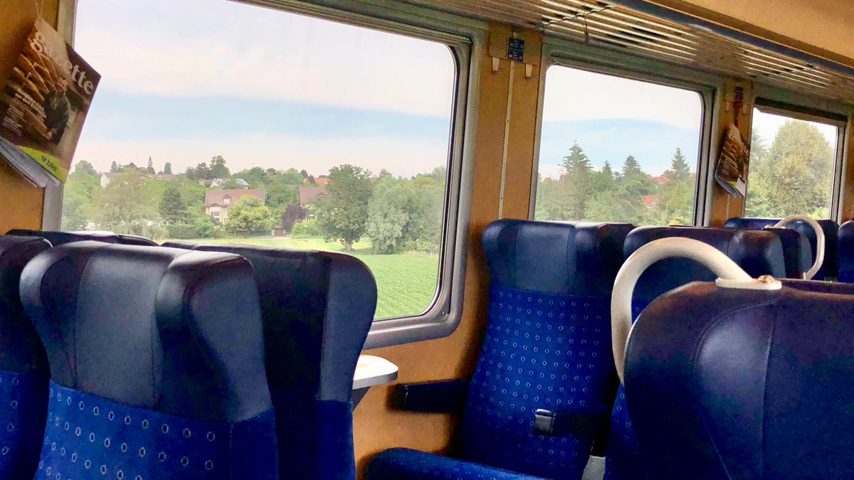 AndreasWiede's tweet photo. La Chaux-de-Fonds🇨🇭to Bern on a #BLS regional service in June 2018: the push-pull trainset is in “Kambly livery” - a popular cookie brand in Switzerland. The cars are of the “EW III” type, originally built for the #SwissExpress in the 1970s - the best Intercity trains back then. https://t.co/pVgUT9Rrrs
