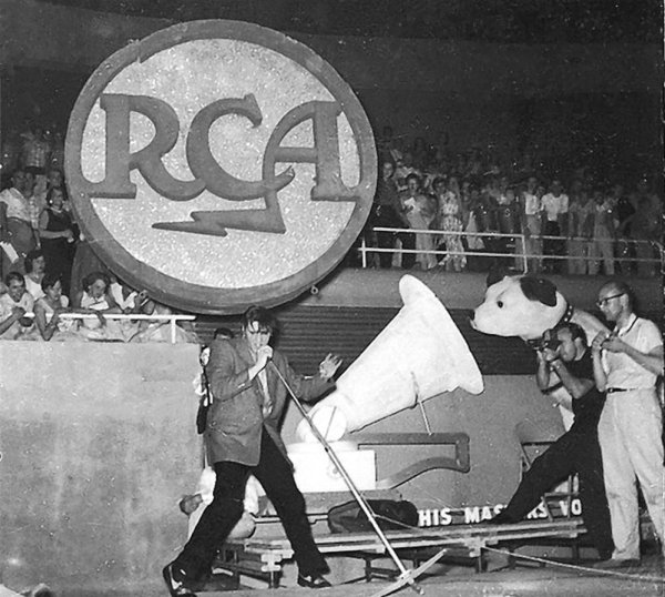 June 26, #Elvis1956 
Elvis onstage at the Charlotte Coliseum
#ElvisHistory 
#Elvis2023 
#ElvisPresley