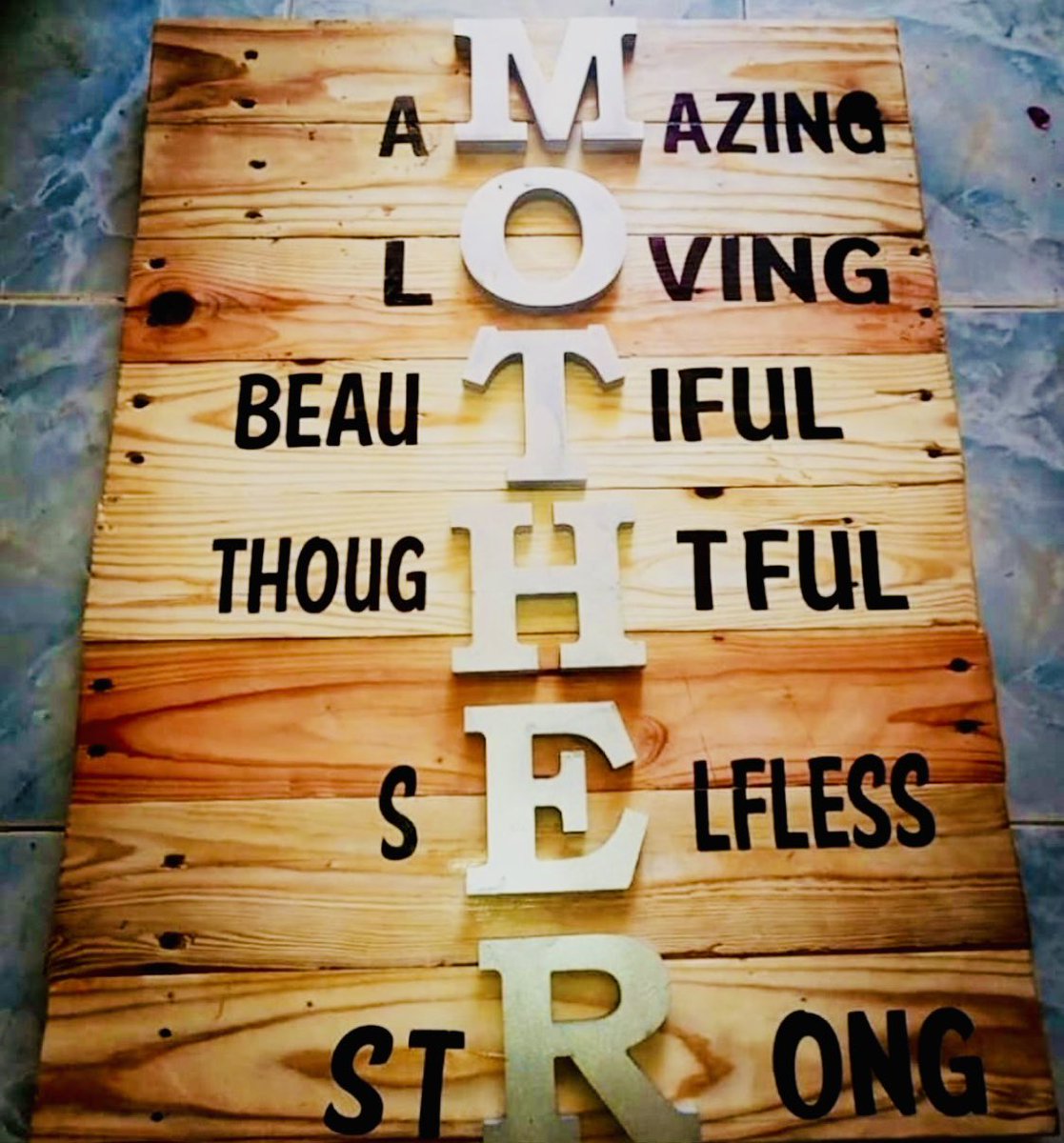 Capturing the essence of motherhood in this stunning wall art. The wooden backdrop and intricate engraving make it a perfect gift for all the incredible moms out there. #MotherhoodInspired #WallArt #WoodenEngraving #GiftsForMoms #LoveYouMom #MomsAreAmazing #CherishMoments #Home