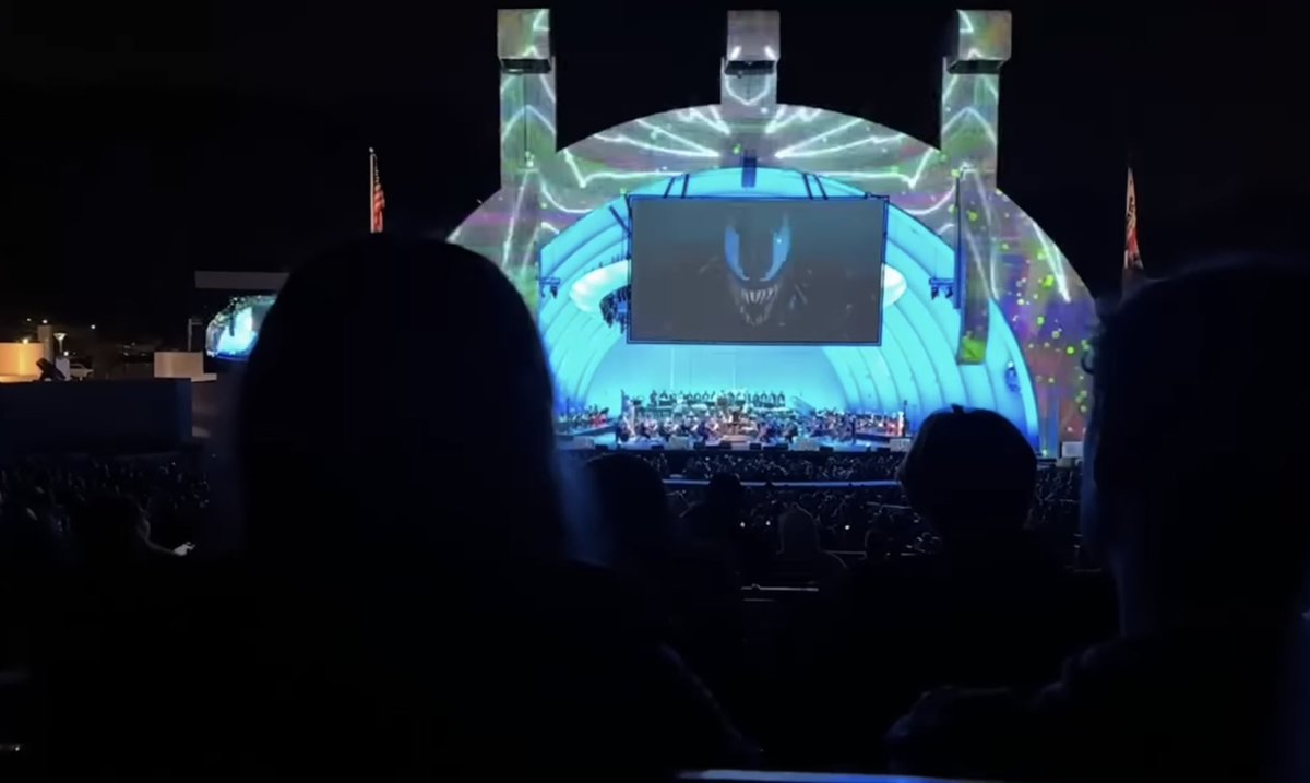The glimpses of Venom’s spider symbol, as well as the flashes of green & purple, during the Marvel’s Spider-Man 2 Main Theme orchestra performance >>>>>>>>>>>
