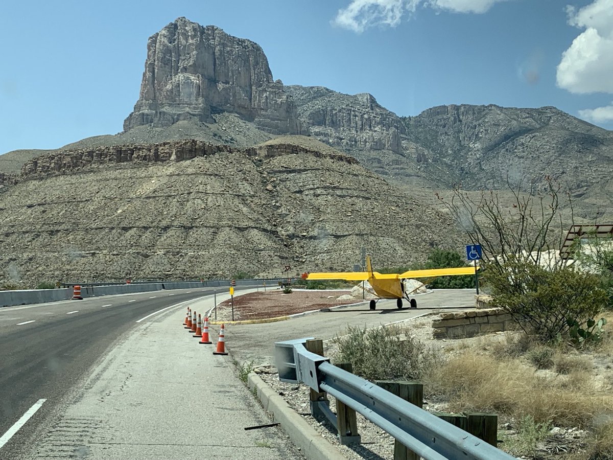 txdotelp's tweet photo. Here’s something you don’t see every day. Our Pine Springs rest area is closed due to an emergency landing on US 62/180 mile marker 125.3. Aircraft is in the East bound rest area and is not blocking any lanes. Happy to report no injuries. Gorgeous view of Guadalupe Peak. https://t.co/biC8bJN1TK