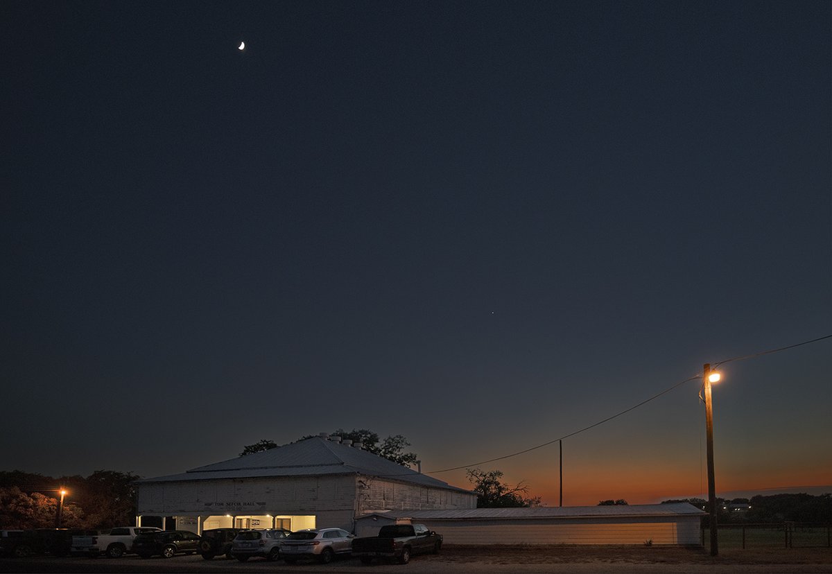 TracesofTexas's tweet photo. The sunset over Sefcik Hall in Seaton last Saturday night. One of my own photos. It's a great place with super nice folks. The current owner is the grandson of Tom Sefcik, who built the hall 100 years ago. People have been dancing there ever since. I grew up nearby and have been to Sefcik many a time, indeed. No lie: it  was 100 degrees when I took this photo.