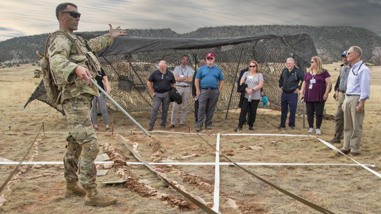 ArmyGeospatial's tweet photo. #SandTables. @4thInfDiv uses sand table to show senior DOD civilians and military leaders how they consolidate gains in battle. https://t.co/5GBd4Ebp9B