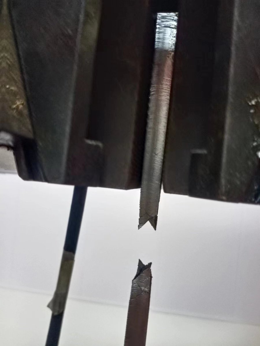 The steel strip is like this after being pulled apart. #steeltensiletest #steelfabrication