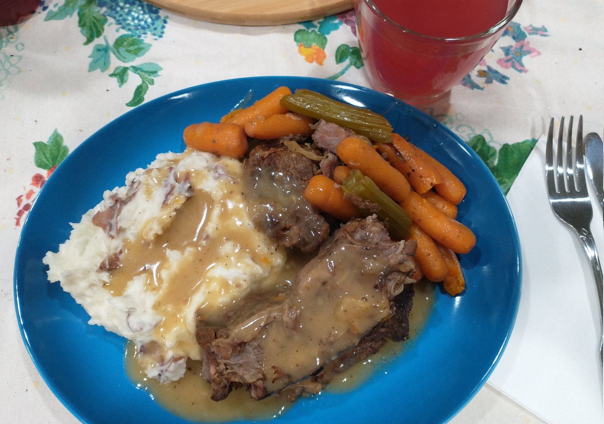 I made Babe pot roast with carrots, celery and onions, with smashed red potatoes and gravy. And having a glass of sangria. #DinnerIsServed