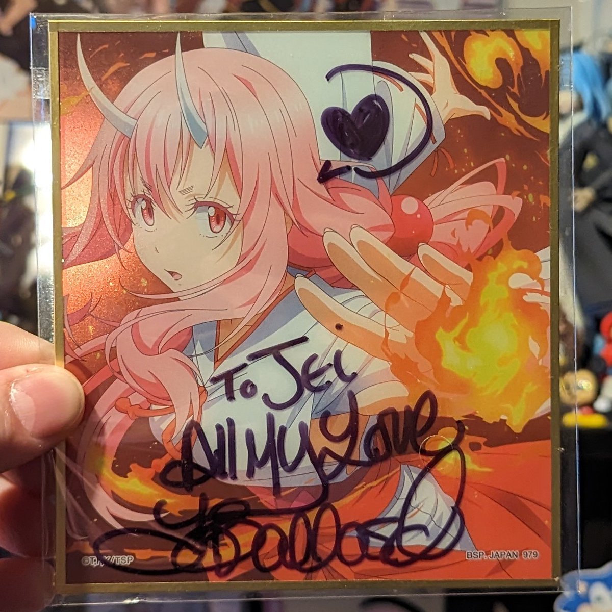 And last, this Shuna thing from Slime Isekai, signed by @TiaToony. I have no idea what this thing is supposed to be, but @HardykunCosplay got it in a gatcha game at a booth at Sakuracon a couple months ago, and I bought it off him for $5 (what he paid to play the game)