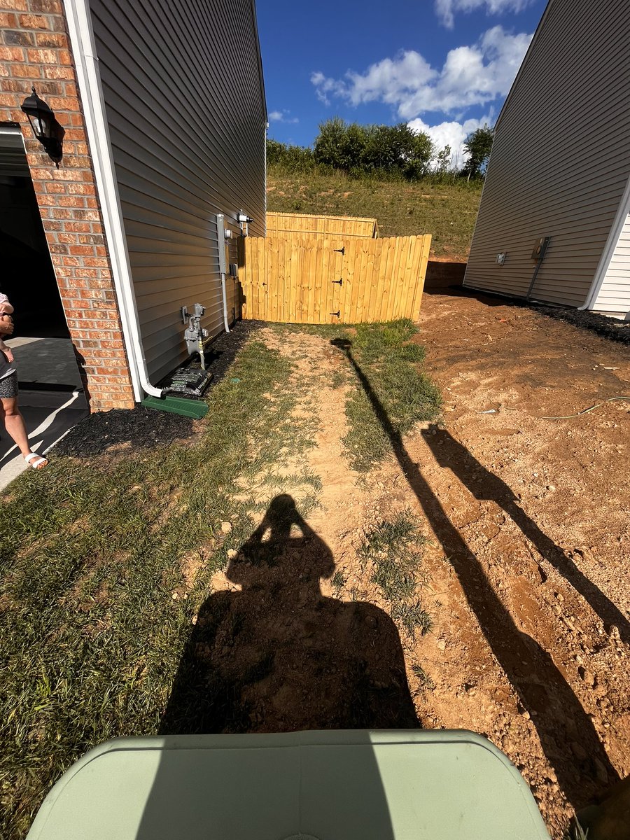 CooperLindhardt's tweet photo. @GetSpectrum you guys ruined my side yard!!
The sod was laid upside down in your “trench” and the orange cable is still exposed in places?? https://t.co/J1KQmwz2QM