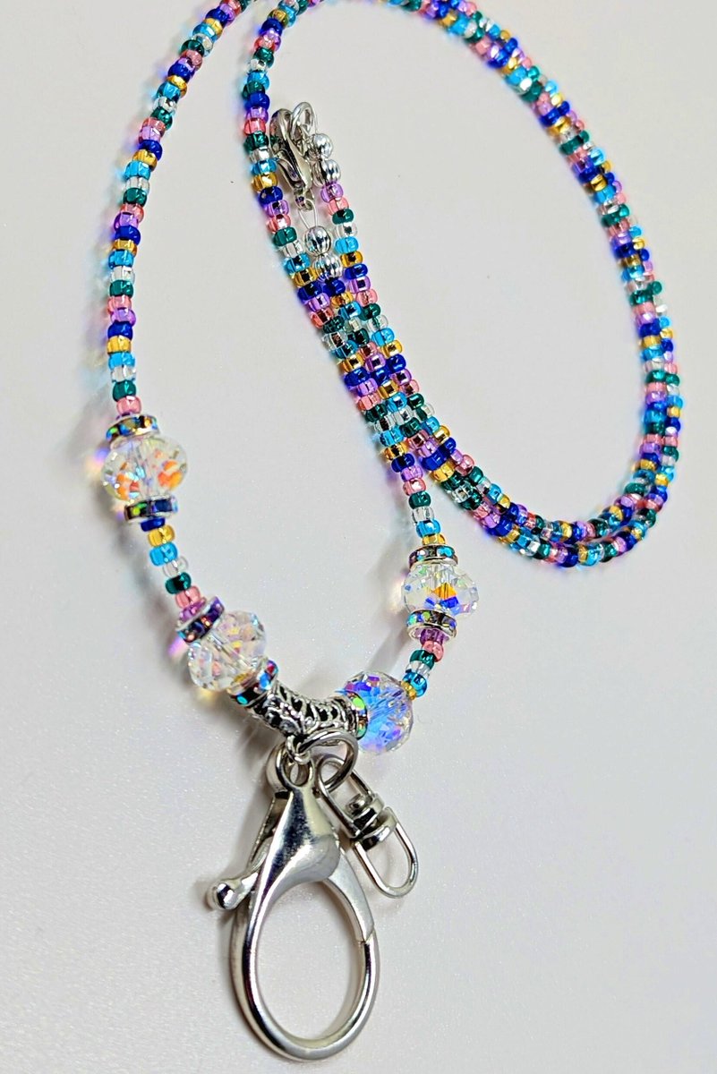 creativedesignsbyvms.etsy Thanks for the great review Kimberly C. ★★★★★! etsy.me/3NMg1rt #etsy #silver #rainbow #badgeidlanyard #womensaccessory #nurselanyard #teacherlanyard #studentlanyard #lightweightlanyard #preciosaseedbeads