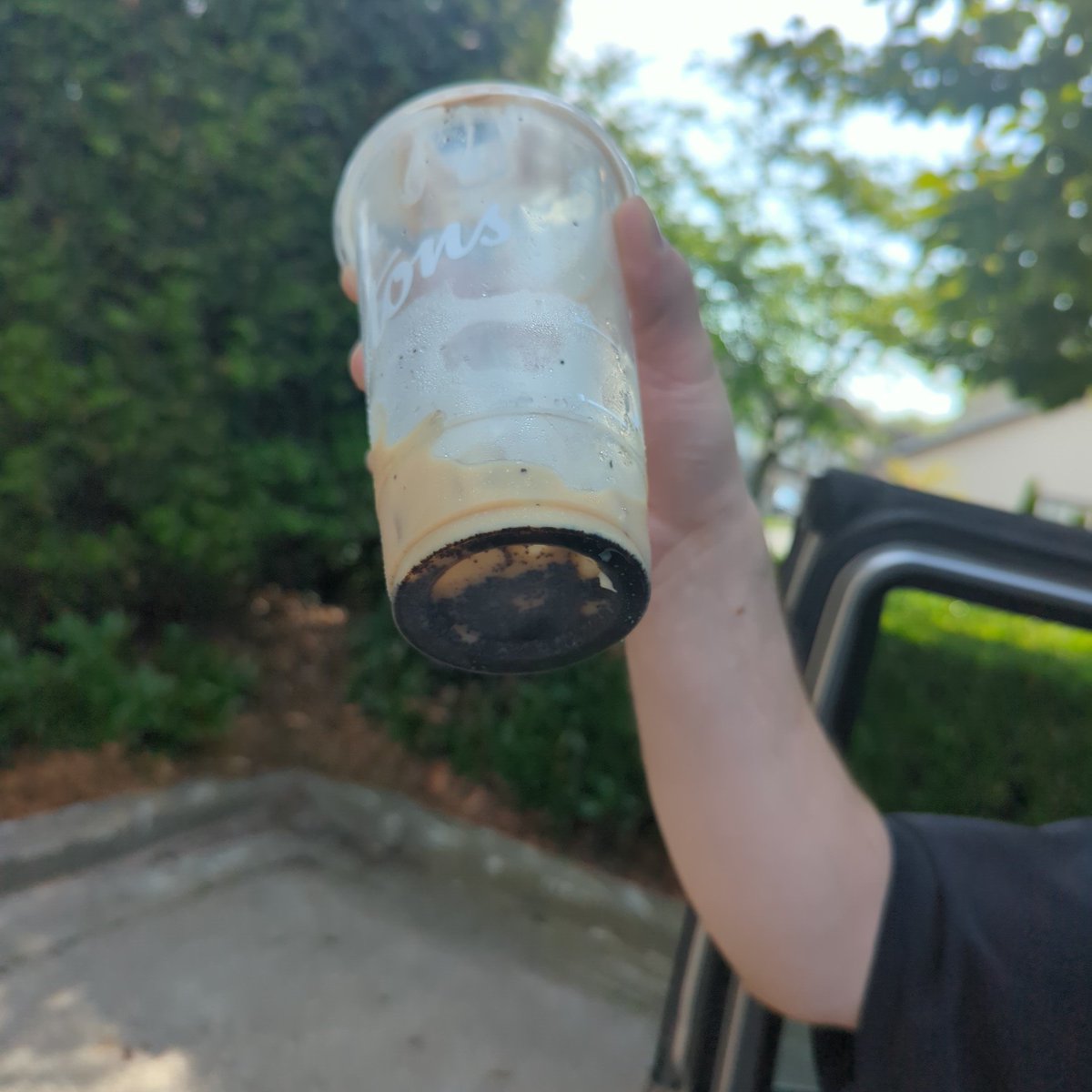 SwartzBryan's tweet photo. Thanks @TimHortons for the beautiful iced coffee. Like I love Tim's but this is getting ridiculous and no that's not chocolate https://t.co/sMsQ1KmyjU