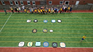 StoneBaySchool's tweet photo. Pupils have been enjoying making marks using lots of different sensory items and in lots of different ways. To celebrate National Writing Day, each class created a letter of our school name and brought it out to the school field to be photographed from the air. #writingday https://t.co/aBBpn6GxbN