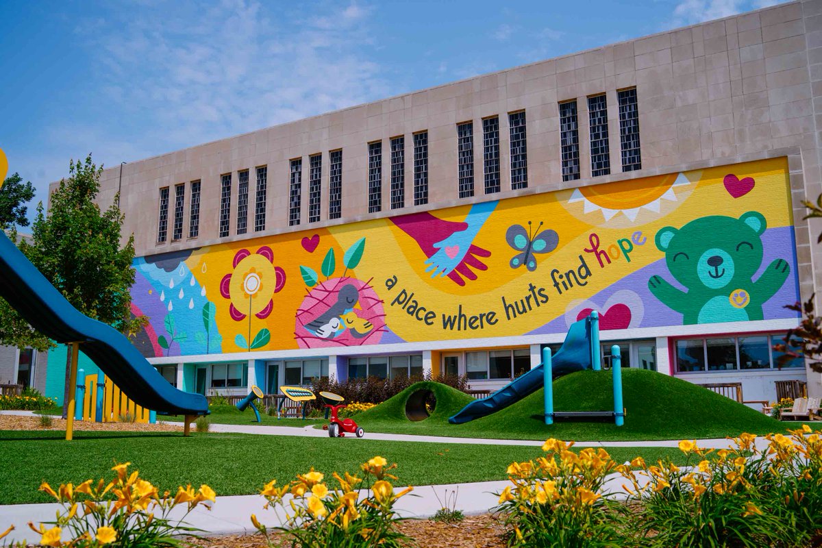 Have you had a chance to see our new mural yet? It's visible over our playground, but you can even catch a glimpse while driving north on Troost toward our building.

Learn more about the fascinating story behind the artwork here: bit.ly/3JlnNak
