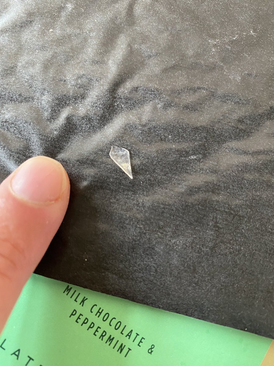 CplSyx's tweet photo. @AfterEightUKI Hello. I was enjoying a few chocolates from one of your selection boxes today when I discovered a piece of plastic in the “dark chocolate &amp; peppermint” chocolate. Photos are attached, hopefully to assist in tracking the issue and ensuring no other issues resulted. https://t.co/kWQJwZwZCT