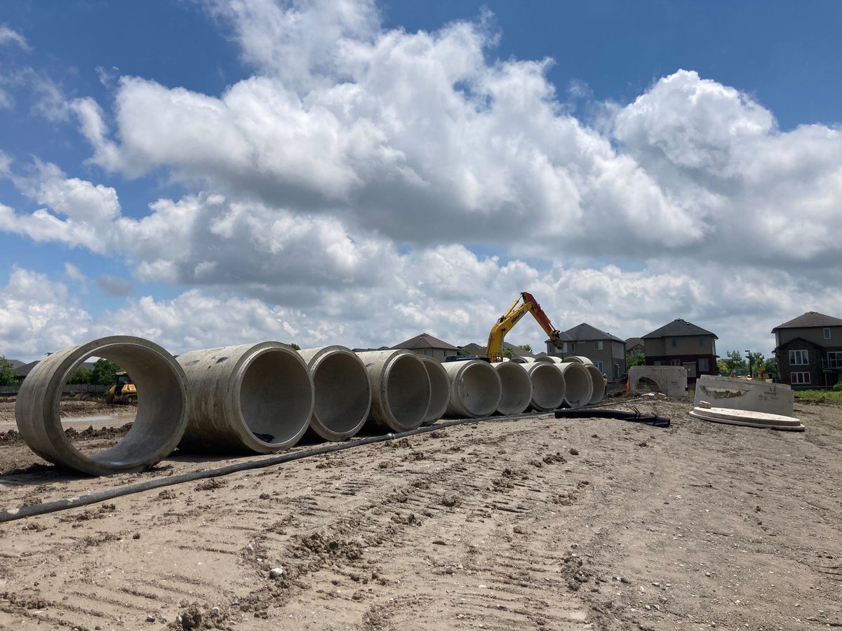 Coldstream_45's tweet photo. CH Excavating underway to bury 60 pcs of 1.8m diameter reinforced concrete pipe with several 3.6m diameter maintenance holes in one of Northwest London's new 313-unit condo developments near Hyde Park Road and Fanshawe Park Road... And there's lots more coming 😀 https://t.co/iKW20Rw9YM