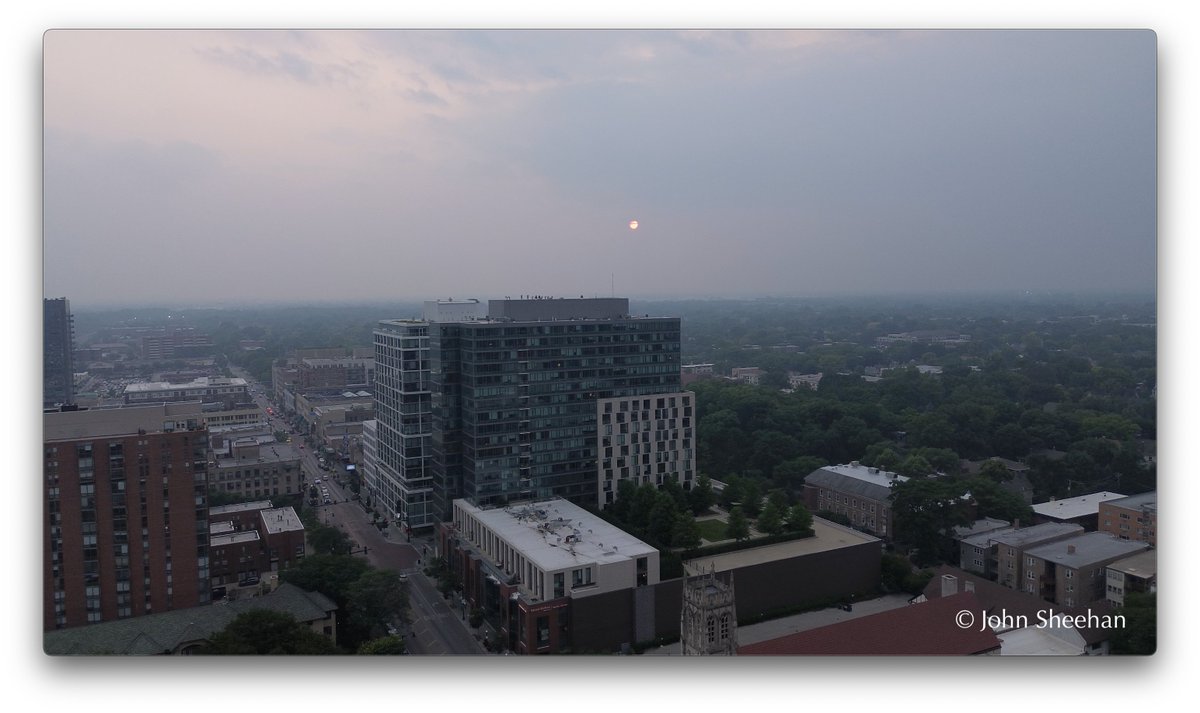 #CanadaFires #Illinois #Chicago #GreatLakes #ClimateShift   
The Sun made a sudden appearance in the last hour of the day above Oak Park in the western suburbs of Chicago.
This photo was taken with a drone at 200 feet in order to get a direct azimuth below the layer of smoke.