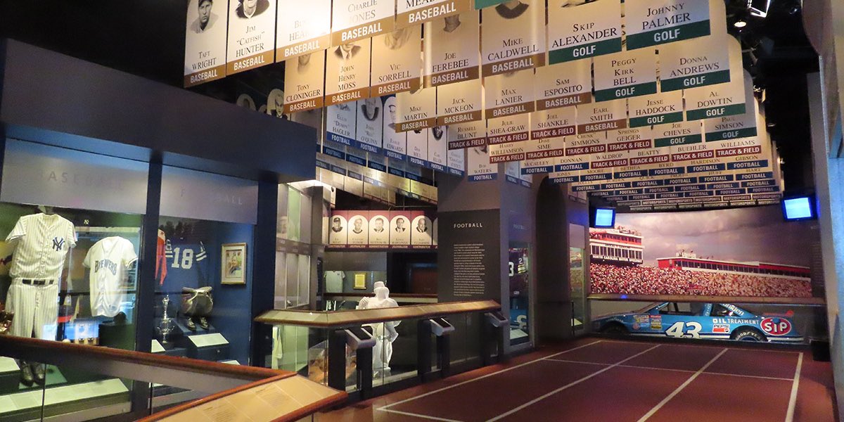 Our NC Sports Hall of Fame features over 360 Tar Heel sports heroes!  

Highlights include: 
- Meadowlark Lemon’s <a href="/Globies/">Harlem Globetrotters</a> basketball uniform🏀
- Champion driver Richard Petty’s stock car🏎️
- <a href="/NCState/">NC State University</a> coach Kay Yow’s Olympic team basketball🏀
- Jim Beatty’s running shoes (1/2)👟