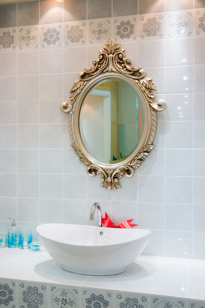 When the rest of the bathroom is fairly straightforward, why not add an interesting piece like this intricate mirror? It adds some character and fun to the room.

Eric Perron - Realtor® - Agent Immobilier - PREN®
ENGEL &amp; VÖLKERS Ottawa Central, Ottawa, ... facebook.com/15622212840321…
