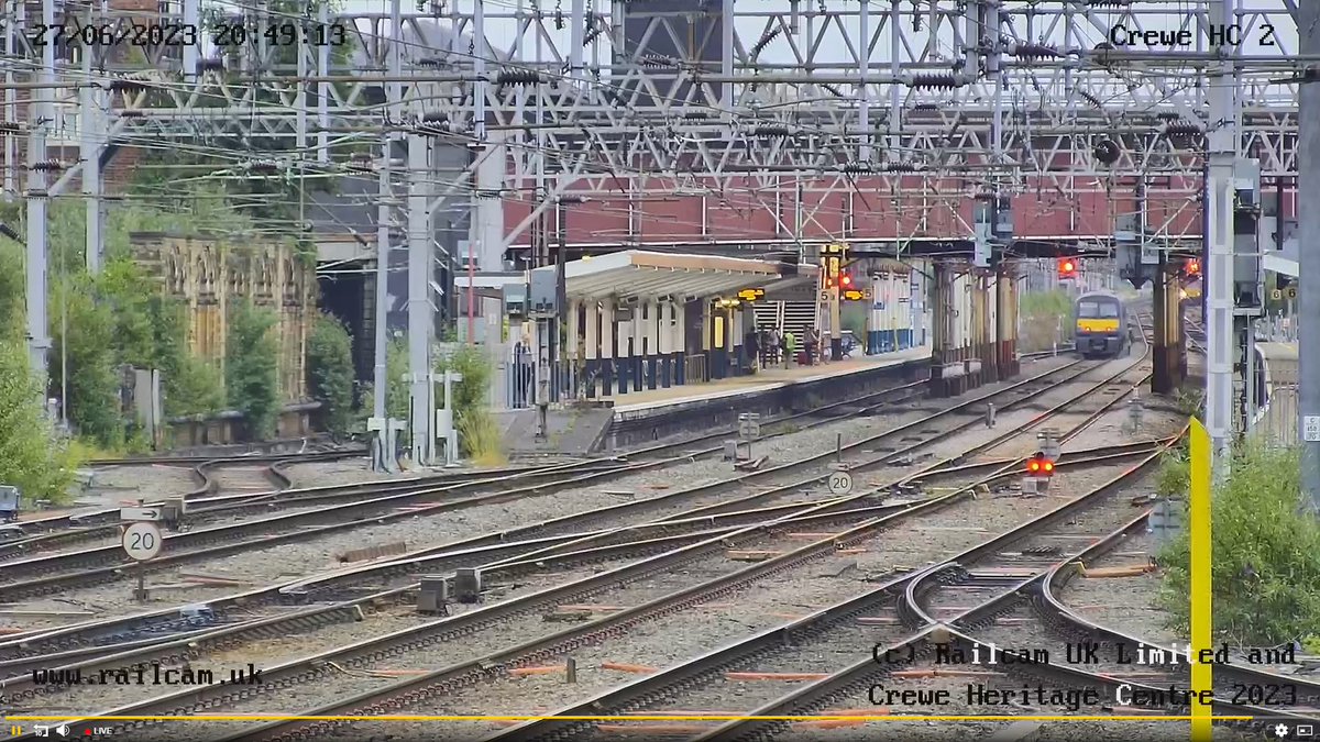 Guard_Amos's tweet photo. Seen through @railcamlive #crewe2 cam. @RailVaramis #brel321334 leaves the Railway town behinds as it heads for @VaramisBHI https://t.co/fxtpiMweJB