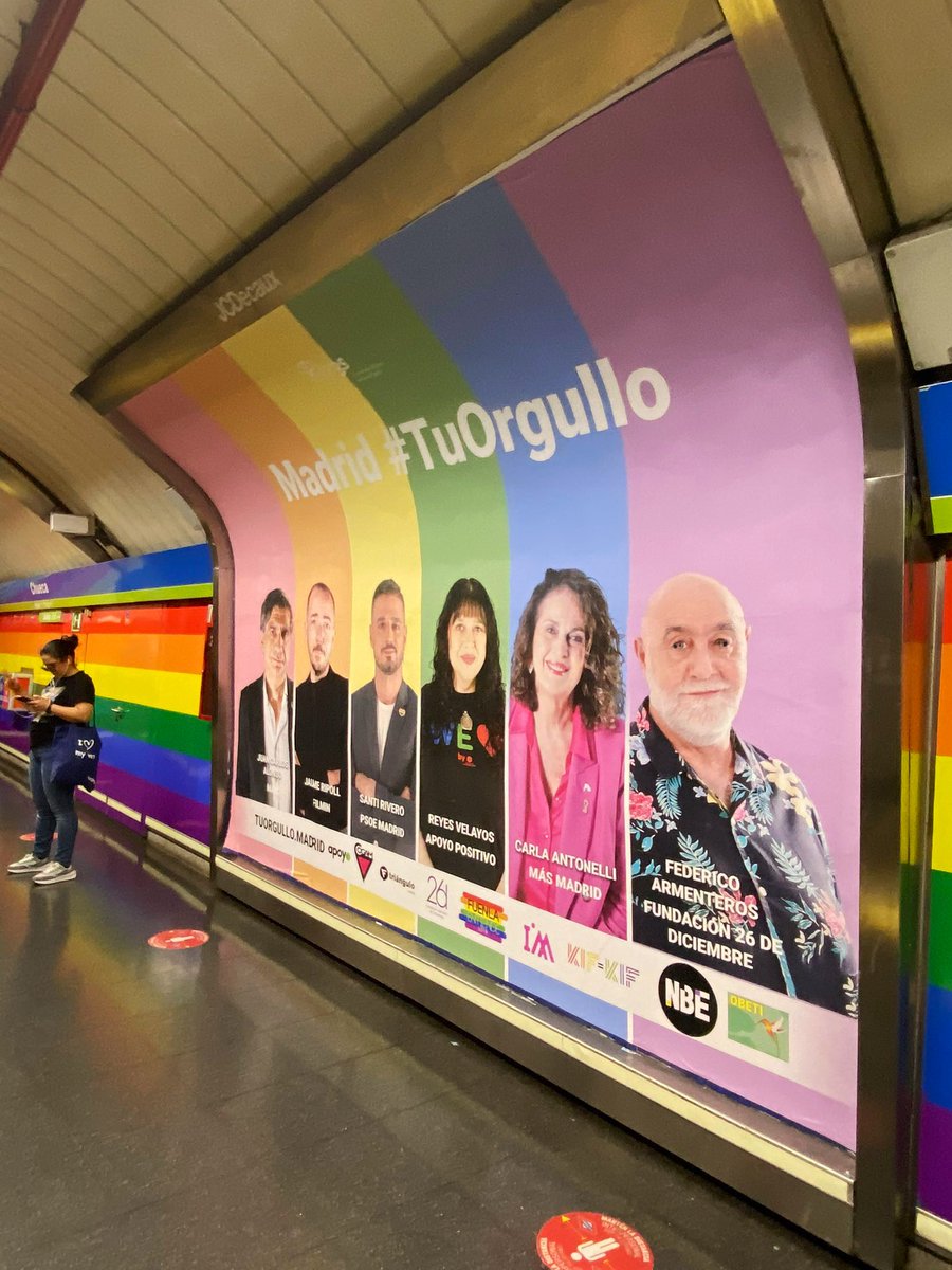 CarlaAntonelli's tweet photo. Mientras que Almeida lleva el cartel del Orgullo al blanco diluido, la Campaña de la @Coord3smad del metro y en las marquesinas de autobuses por el Pride 2023 inundan de colores la capital, bajo el lema de: Madrid #TuOrgullo. Este 1 de julio llenaremos de nuevo los espacios, a pesar Almeida, Ayuso y el PP, para que no sea el último #Orgullo tomemos las calles ✊🏳️‍⚧️🏳️‍🌈