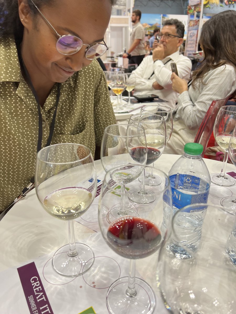 NYFarmer's tweet image. After the discussions, the Italian farmers are rolling out the wines for tasting. Truly, no need for fake wine or #fakefood