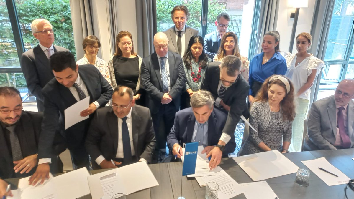 TheICMP's tweet image. Chancellor Khaled Diab from the Center for Judicial Expertise of #Libya’s Ministry of Justice, Dr. Elias Elhammruni from the permanent Technical Committee on #Massgraves &amp;amp; #MissingMigrants &amp;amp; Ambassador Thomas Miller Chairperson of the #ICMP have signed a Technical Cooperation