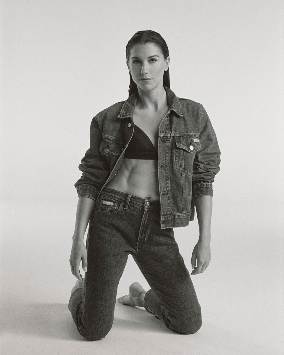 CalvinKlein's tweet photo. the original uniform is relaxed denim. @alexmorgan13 in Calvins or nothing https://t.co/SpzjQkByWv